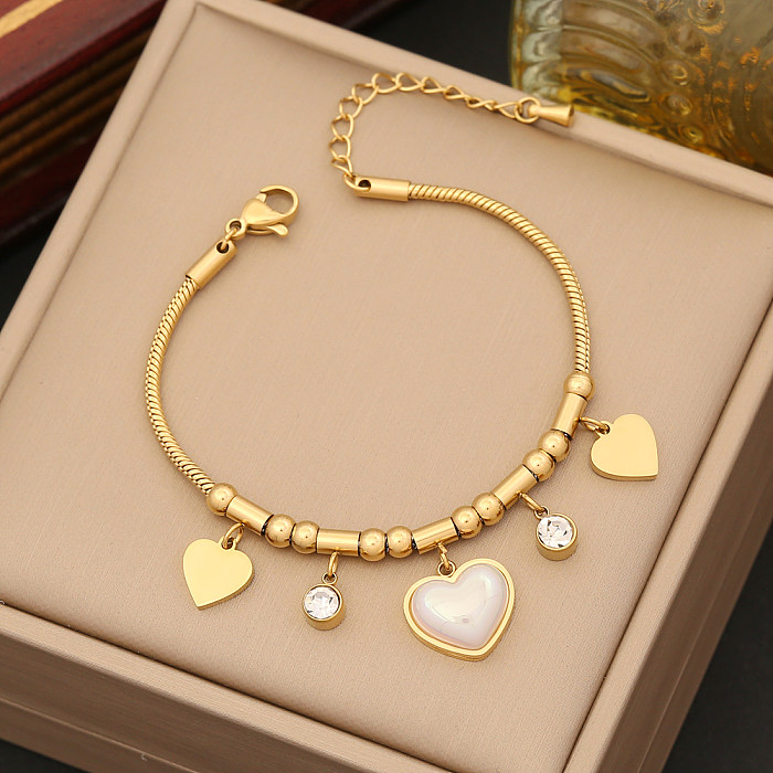 Bracelets et boucles d'oreilles en acier inoxydable pour femmes, Style Simple, incrustation de perles artificielles et de strass en forme de cœur