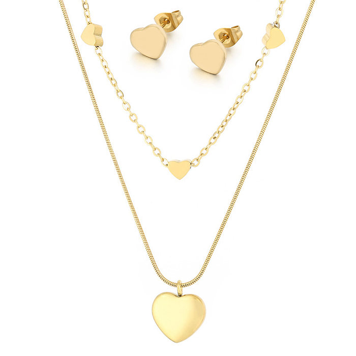 Elegante collar de pendientes chapado en oro de 18 quilates con forma de corazón y estrella de viaje, chapado en capas de acero de titanio