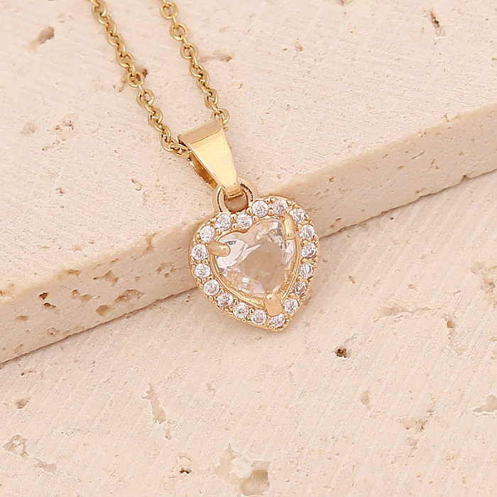 Conjunto de joyería con aretes y collar de cobre con incrustaciones de circón en forma de corazón de moda