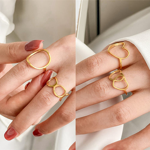 Anillos de revestimiento de acero de titanio con forma de corazón redondo de estilo simple