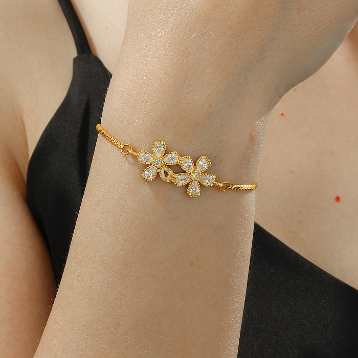 Elegante estilo simples forma de coração humano flor chapeamento de cobre incrustação zircão pulseiras banhadas a ouro 18K