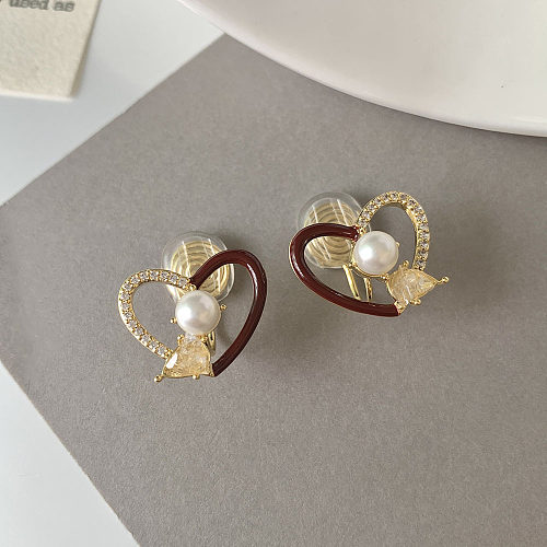 1 par de manguitos de oreja de circonio con perlas artificiales de cobre con incrustaciones de chapado en forma de corazón de bloque de Color dulce