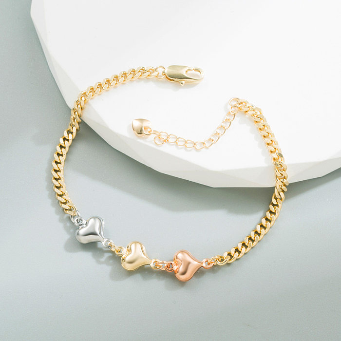 Bracelets de placage de cuivre d'éléphant de forme de coeur de croix de mode