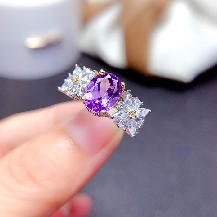 Luxuriöser offener Ring aus Kupfer mit ovaler Blume und künstlichem Kristall in großen Mengen