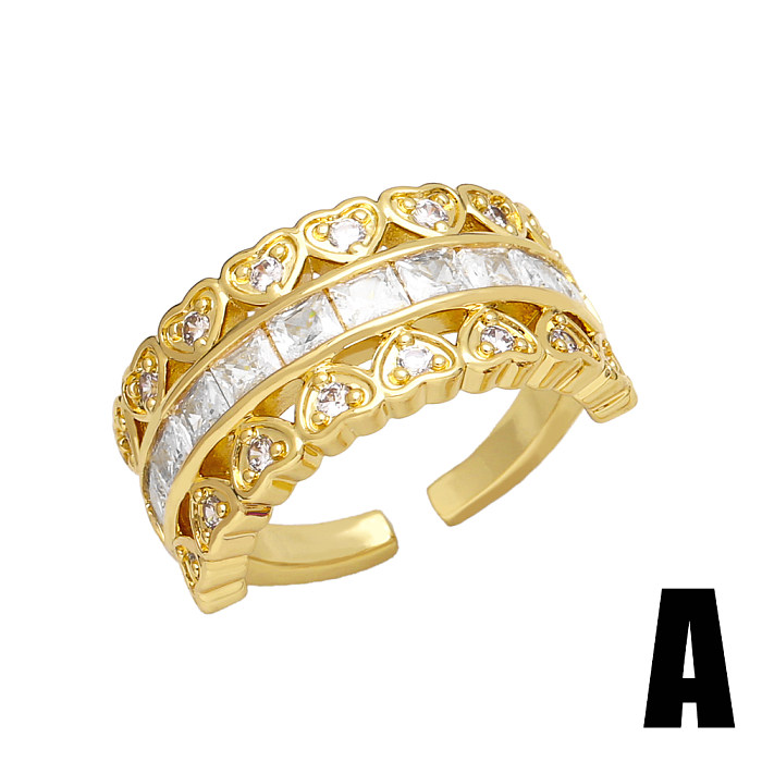 Glänzender, unregelmäßiger, quadratischer, herzförmiger offener Ring aus Kupfer mit 18 Karat vergoldetem Zirkon in großen Mengen