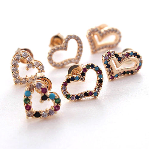 1 par de brincos de orelha banhados a ouro com zircônia de cobre estilo simples em forma de coração