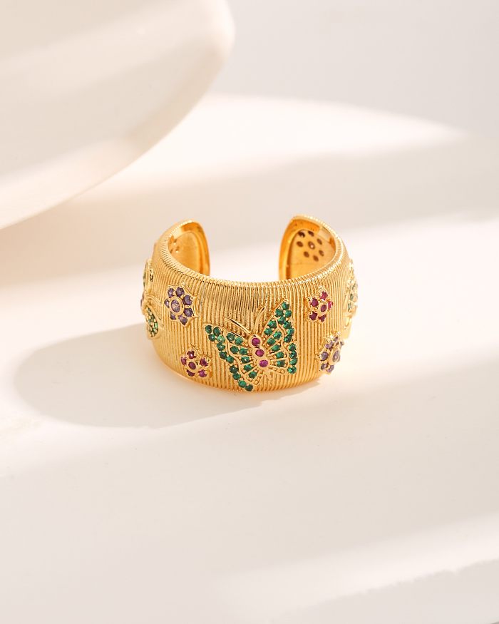 حلقات مفتوحة مطلية بالذهب على شكل زهرة فراشة على الطراز الفرنسي ومرصعة بالزركون ومطلية بالذهب عيار 18 قيراط