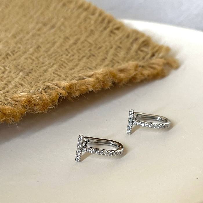1 paire de boucles d'oreilles plaquées or blanc, Style Simple, incrustation de lettres en cuivre et Zircon