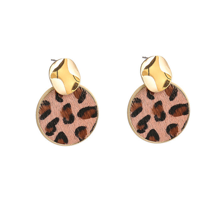1 paire de boucles d'oreilles rétro dame léopard en cuivre plaqué or
