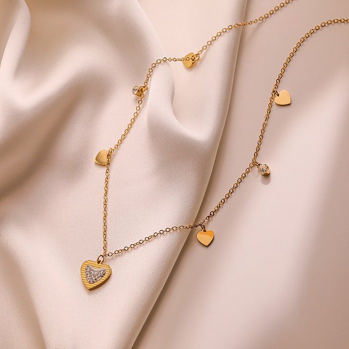 Estilo simples comute coração forma titânio chapeamento de aço inlay zircon 18k banhado a ouro pulseiras colar