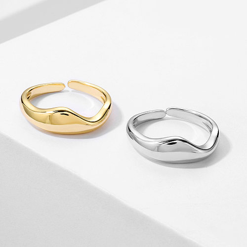 Offener Ring mit geometrischer Verkupferung und 14-Karat-Vergoldung für Damen