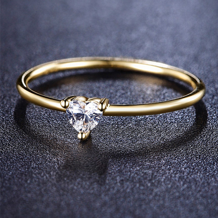 Estilo simples forma de coração chapeamento de cobre embutido pedras preciosas artificiais anéis banhados a ouro 18K
