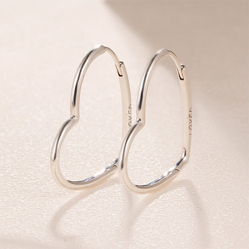 1 paire de boucles d'oreilles créoles en cuivre en forme de cœur, style simple