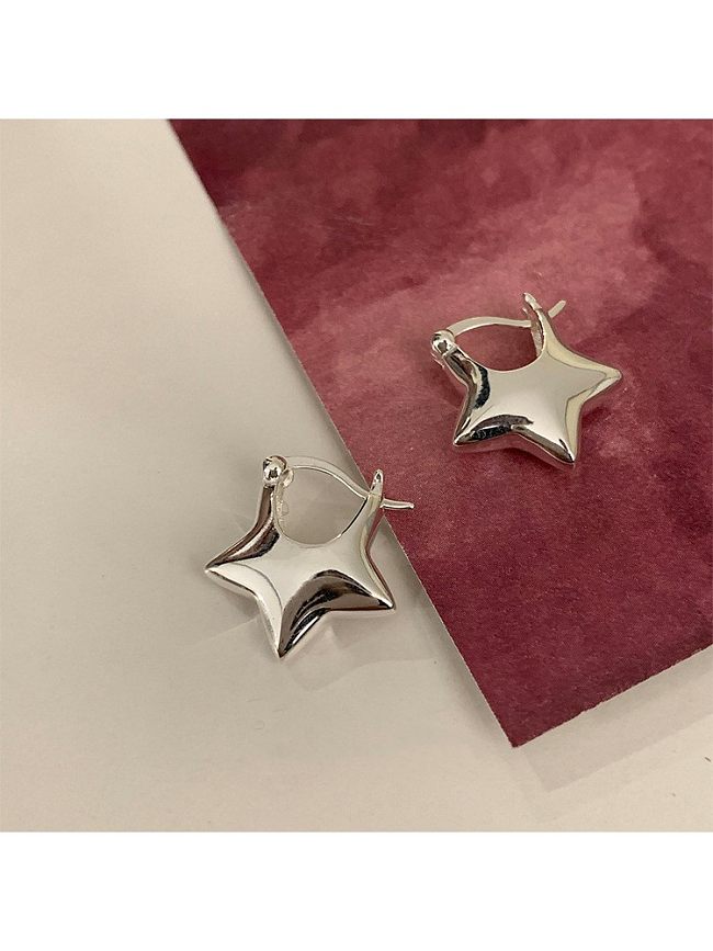 1 par de aretes de cobre con revestimiento de estrella estilo IG