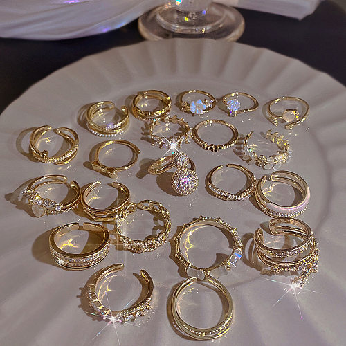 Anillo abierto de diamantes de imitación con incrustaciones de cobre y flores de estilo simple