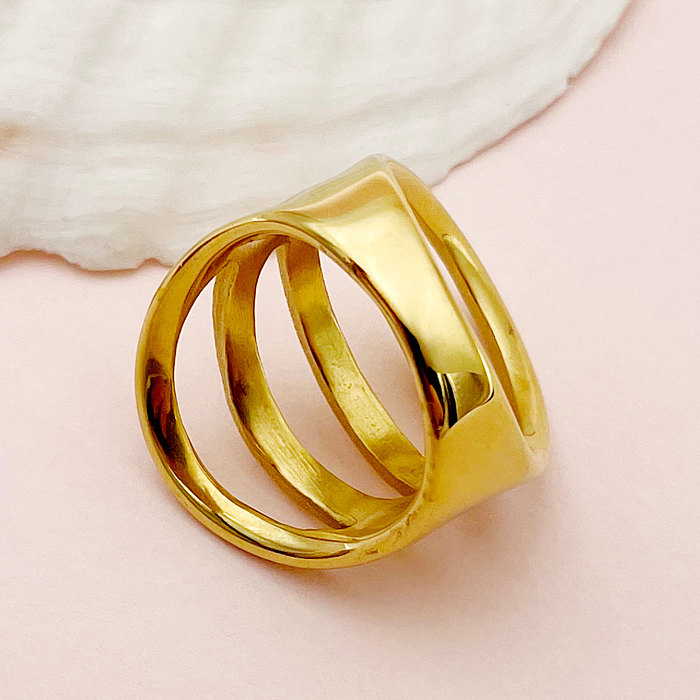O chapeamento de aço inoxidável da cor sólida do deslocamento do estilo simples escava anéis banhados a ouro