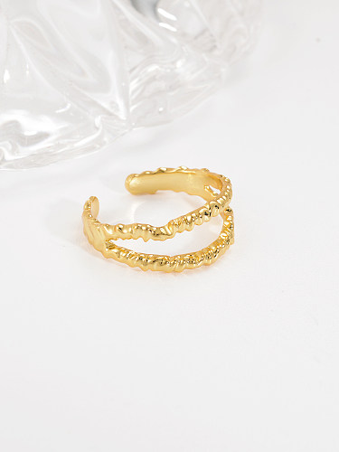 As linhas de estilo simples do estilo IG torcem o chapeamento de cobre oco para fora do anel aberto banhado a ouro 18K