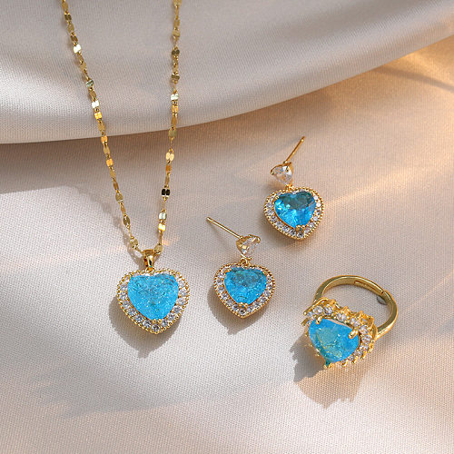 Luxuriöse herzförmige Titanstahl-Intarsien mit künstlichen Edelsteinen für Damen, Ringe, Ohrringe, Halskette