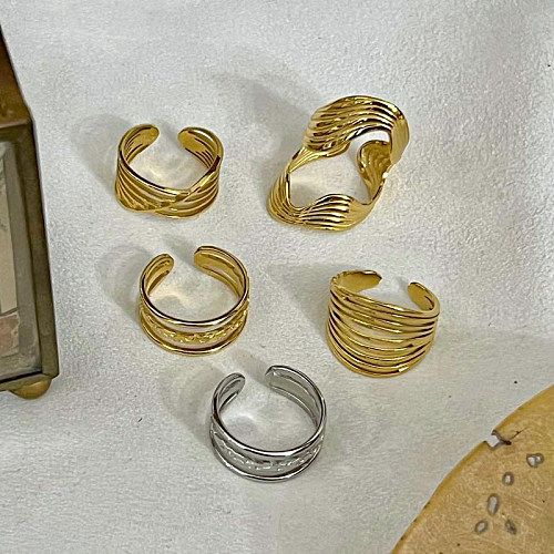 Großhandel Lässiger offener Ring aus einfarbigem Titanstahl mit 18 Karat Goldplattierung