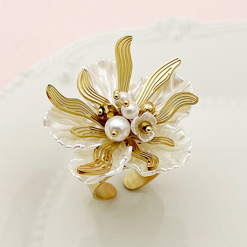 Anillos chapados en oro con perlas y incrustaciones de acero inoxidable con flores románticas