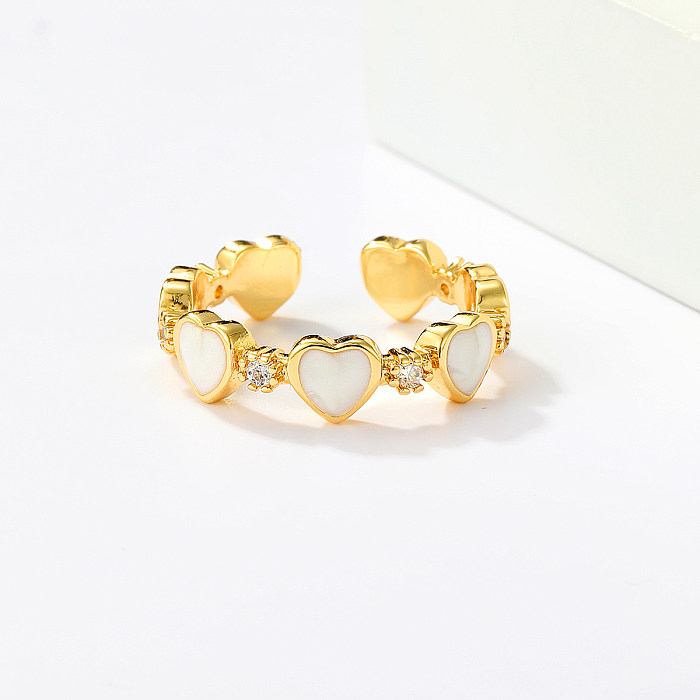 Einfacher offener Ring in Herzform mit Kupferbeschichtung und Zirkoneinlage, 18 Karat vergoldet