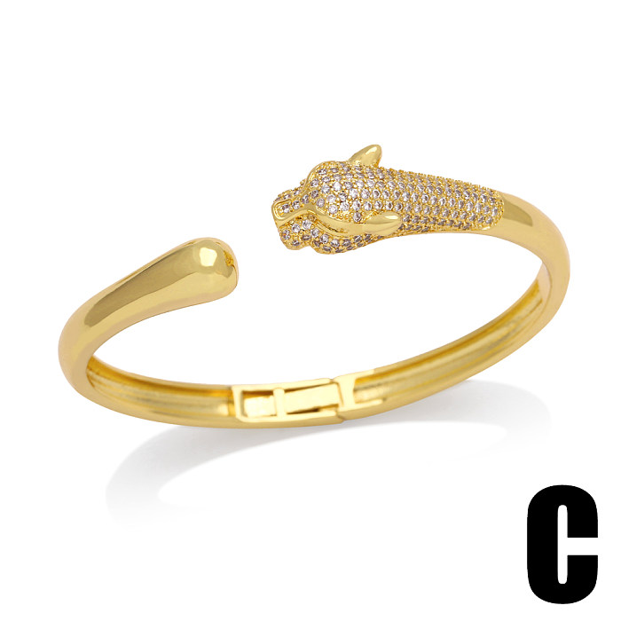 Hip-hop estilo legal animal formato de coração cobra revestimento de cobre incrustação zircão pulseira banhada a ouro 18K