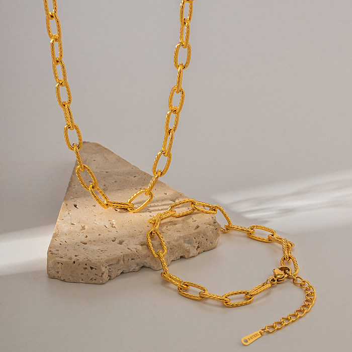 INS-Stil Retro The Answer Edelstahlbeschichtung 18 Karat vergoldete Armbänder Halskette