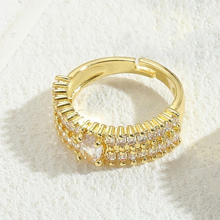 O ouro redondo luxuoso do zircão 14K do embutimento do chapeamento de cobre chapeou anéis abertos