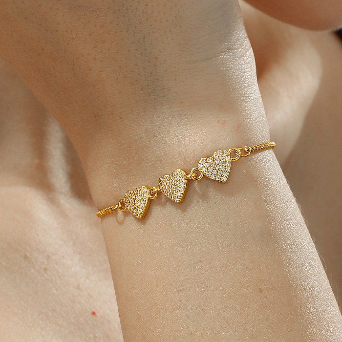 Elegante estilo simples forma de coração humano flor chapeamento de cobre incrustação zircão pulseiras banhadas a ouro 18K