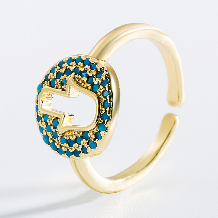 Modischer, hohler Teufelsauge-Ring mit verkupfertem 18-karätigem Gold und mikroeingelegtem Zirkon