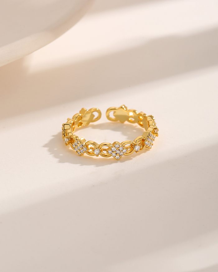El chapado en cobre redondo del estilo simple del estilo moderno ahueca hacia fuera los anillos abiertos plateados oro 18K del Zircon del embutido