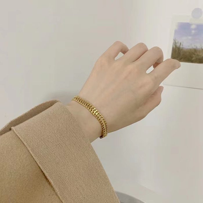Collier de bracelets des femmes de placage d'acier de titane de grain de style simple