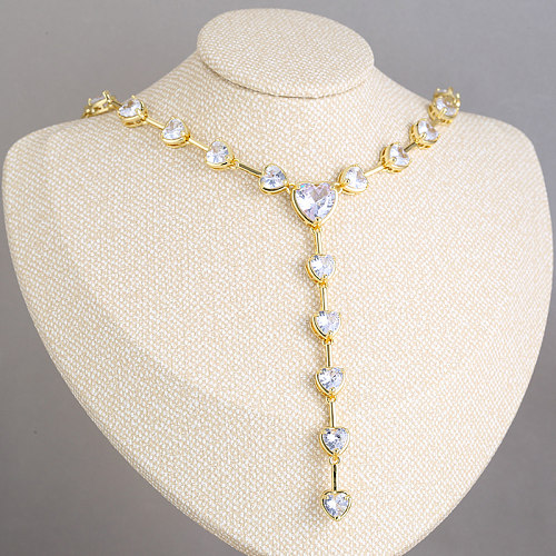 Elegante, glamouröse, herzförmige, verkupferte Inlay-Zirkon-Armband-Halskette mit 18-Karat-Vergoldung