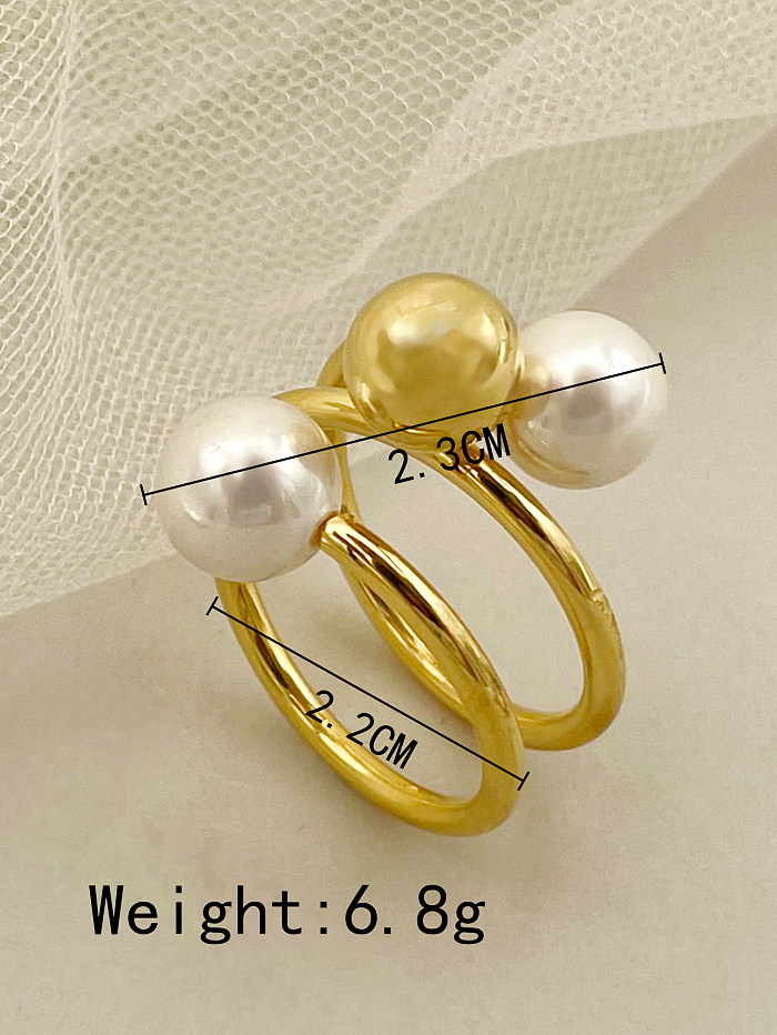 O ouro de aço inoxidável redondo elegante chapeou anéis de pérolas artificiais no volume
