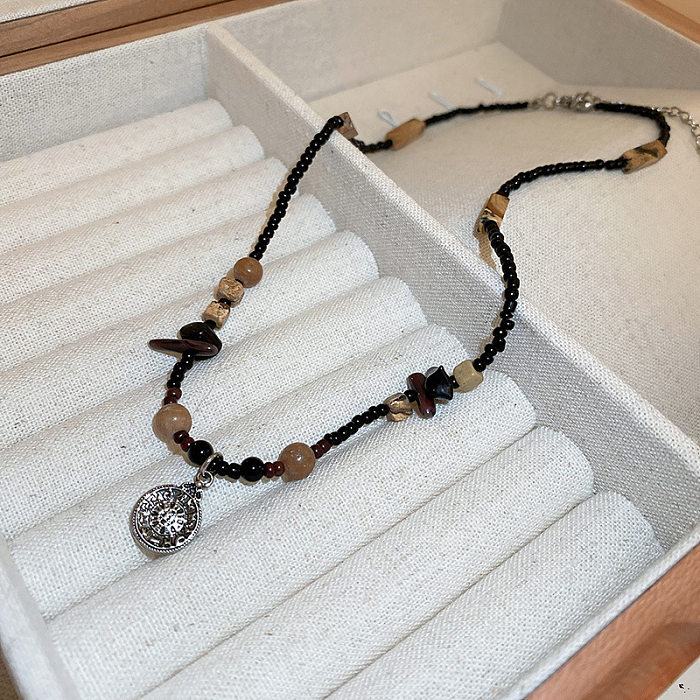 Collier pendentif rétro en perles de cuivre avec serrure papillon et fleur