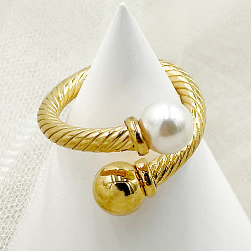 O estilo romano comuta anéis chapeados ouro de aço inoxidável da cor sólida