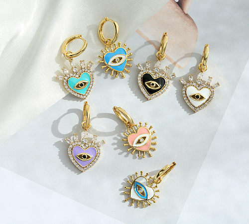 Retro Micro-inlaid Eyes Heart Shape Copper Plated Ear Clip Wholesale jewelry