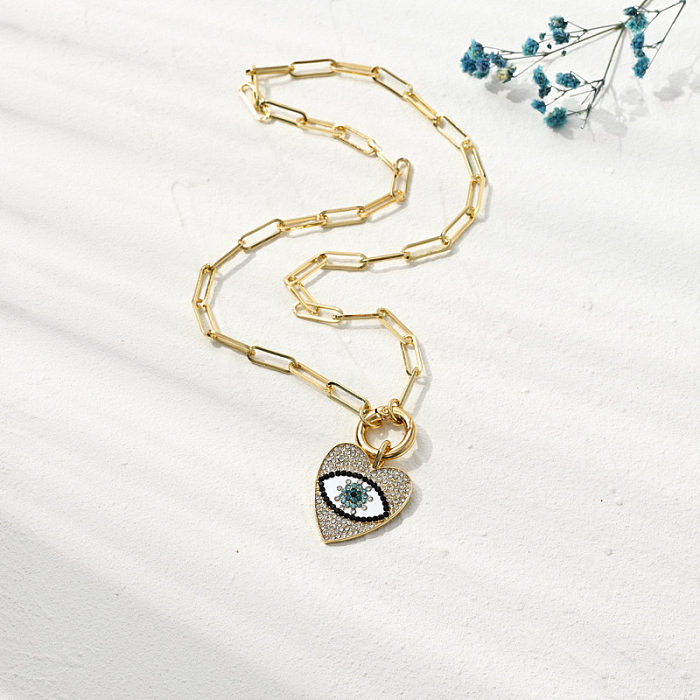 Nuevo Clip creativo Ojo del Diablo collar de circonita de cobre colgante de ojo de corazón con incrustaciones de diamantes a la moda para mujer