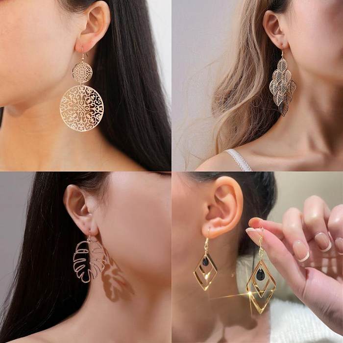 1 Pair Casual Vintage Style Human Face Leaf Heart Shape Plating Hollow Out Inlay Alloy Metal Brass Resin Zircon 18K Gold Plated Gold Plated Silver Plated Earrings