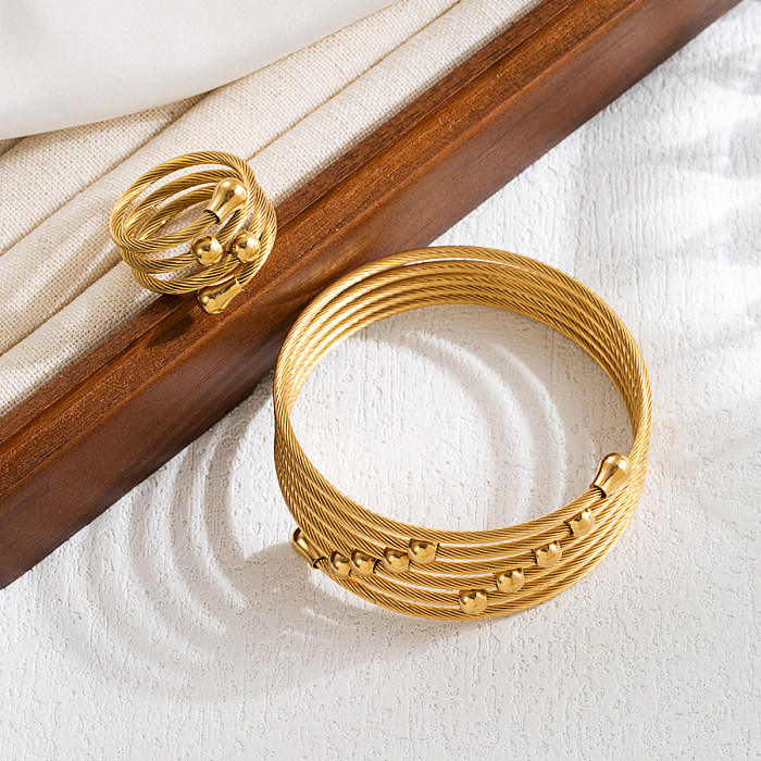 Pulseiras de anéis banhados a ouro 18K com revestimento em camadas de aço inoxidável redondo elegante estilo INS