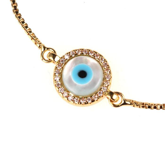 Nouveaux accessoires Bracelet oeil bleu oeil du diable Micro incrusté de diamant coquille tirant le Bracelet en Zircon