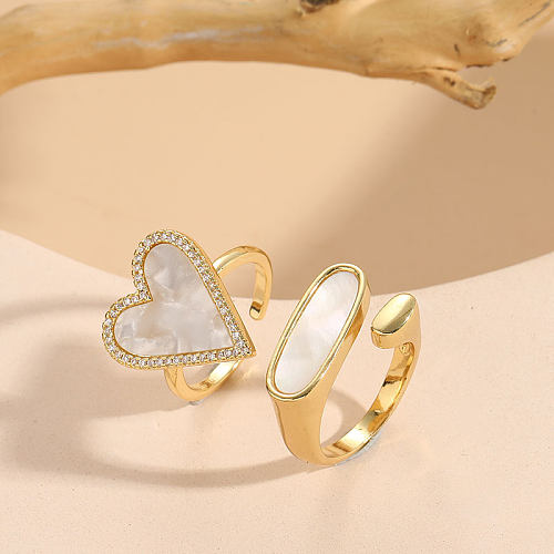 Eleganter, luxuriöser, klassischer, herzförmiger, verkupferter offener Ring mit Muschel-Zirkon-Inlay und 14-Karat-Vergoldung