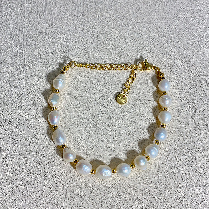 Geometrische Edelstahl-Kristall-Süßwasserperlen-Perlenüberzug-Armband-Halskette im INS-Stil