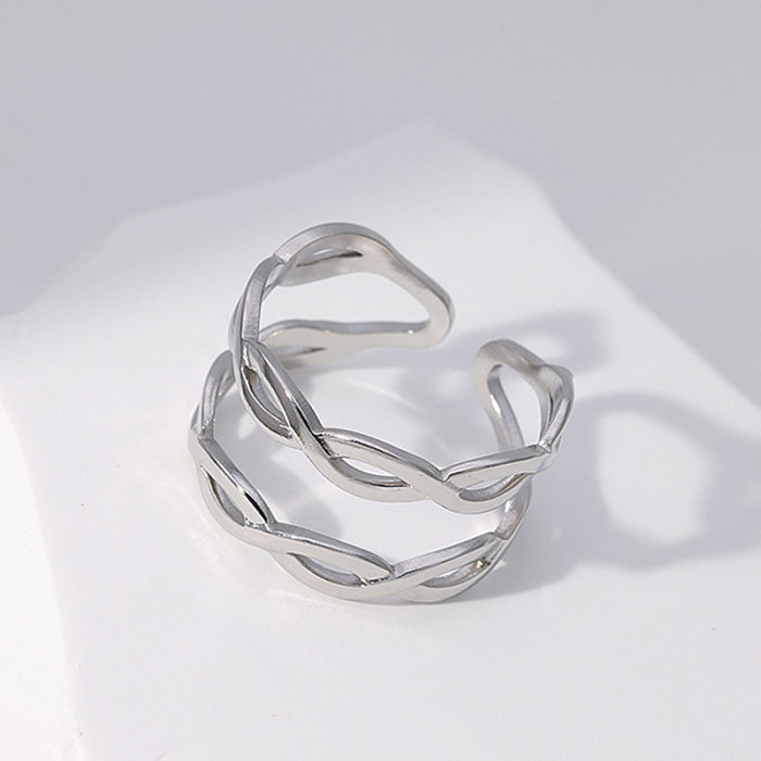 Simple Style Solid Color Twist Titanium Steel Hollow Out Rings