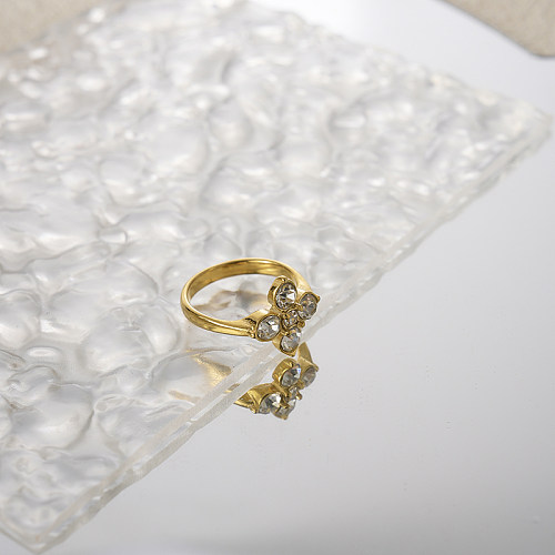 Atacado comutar flor chapeamento de aço inoxidável inlay anéis de zircão banhado a ouro