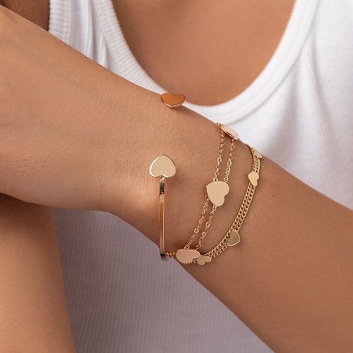 Bracelets de placage de cuivre d'alliage de forme de coeur de trajet de style classique de style simple