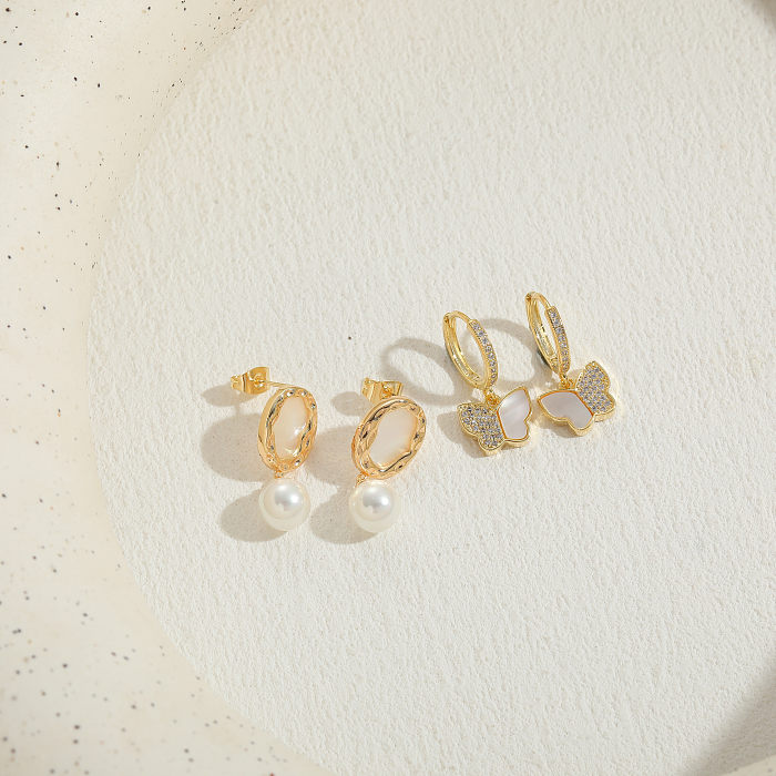 1 Paar klassische Schmetterlings-Ohrringe mit asymmetrischer Beschichtung, Kupfer-Zirkon-Inlay, 14 Karat vergoldet