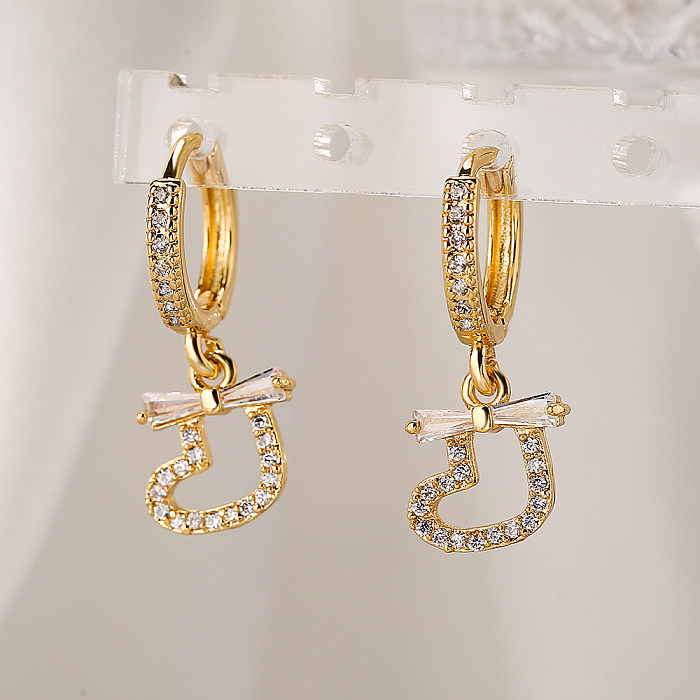 1 paire de boucles d'oreilles pendantes en forme de cœur, Style Simple et doux, incrustation de nœud papillon en cuivre et Zircon plaqué or 18 carats