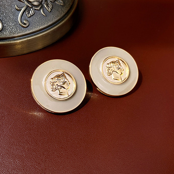 1 par de pendientes clásicos de cobre con incrustaciones de esmalte cruzado para mujer