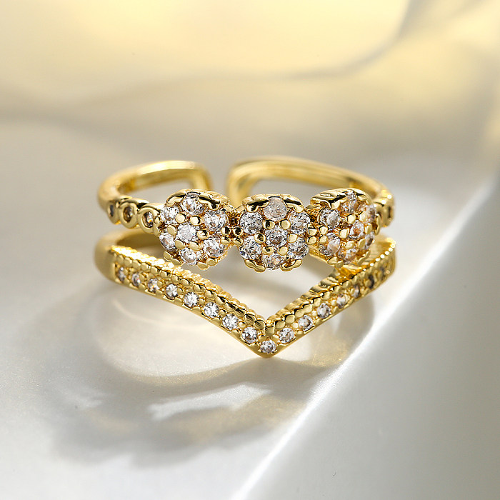 O estilo simples comuta anéis abertos geométricos do zircão 18K do embutimento do chapeamento de cobre banhados a ouro